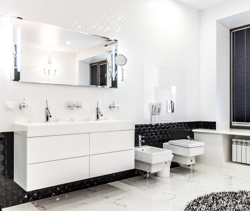 A Beautiful Black and White Themed Bathroom in a Luxury Home